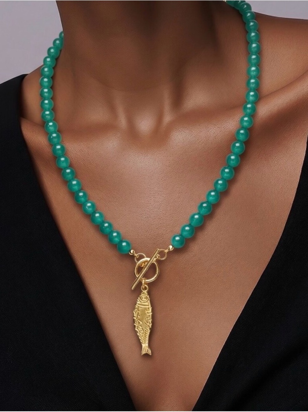Mayamar Blue Glass Beaded Necklace w 24k
Gold Plated Fish Charm